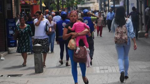 People walking in a street of Honduras.